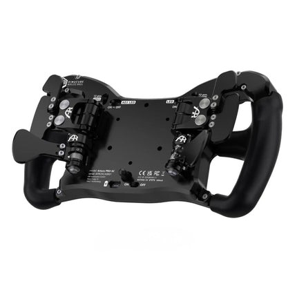 Detail close-up of the back of the black steering wheel with buttons and grips.