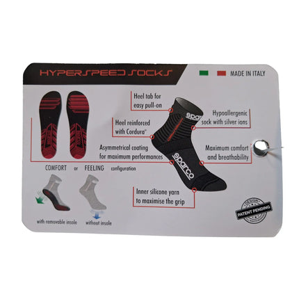 Detail of black sock featuring textured design and red accents